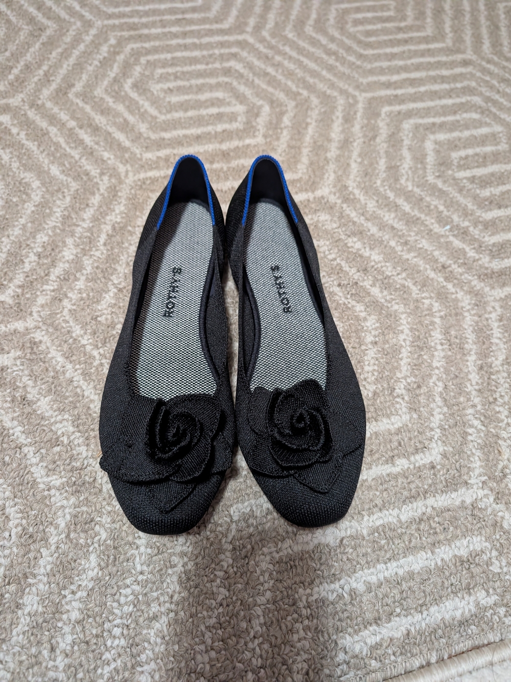 Black Rothy's Rosette Flats.